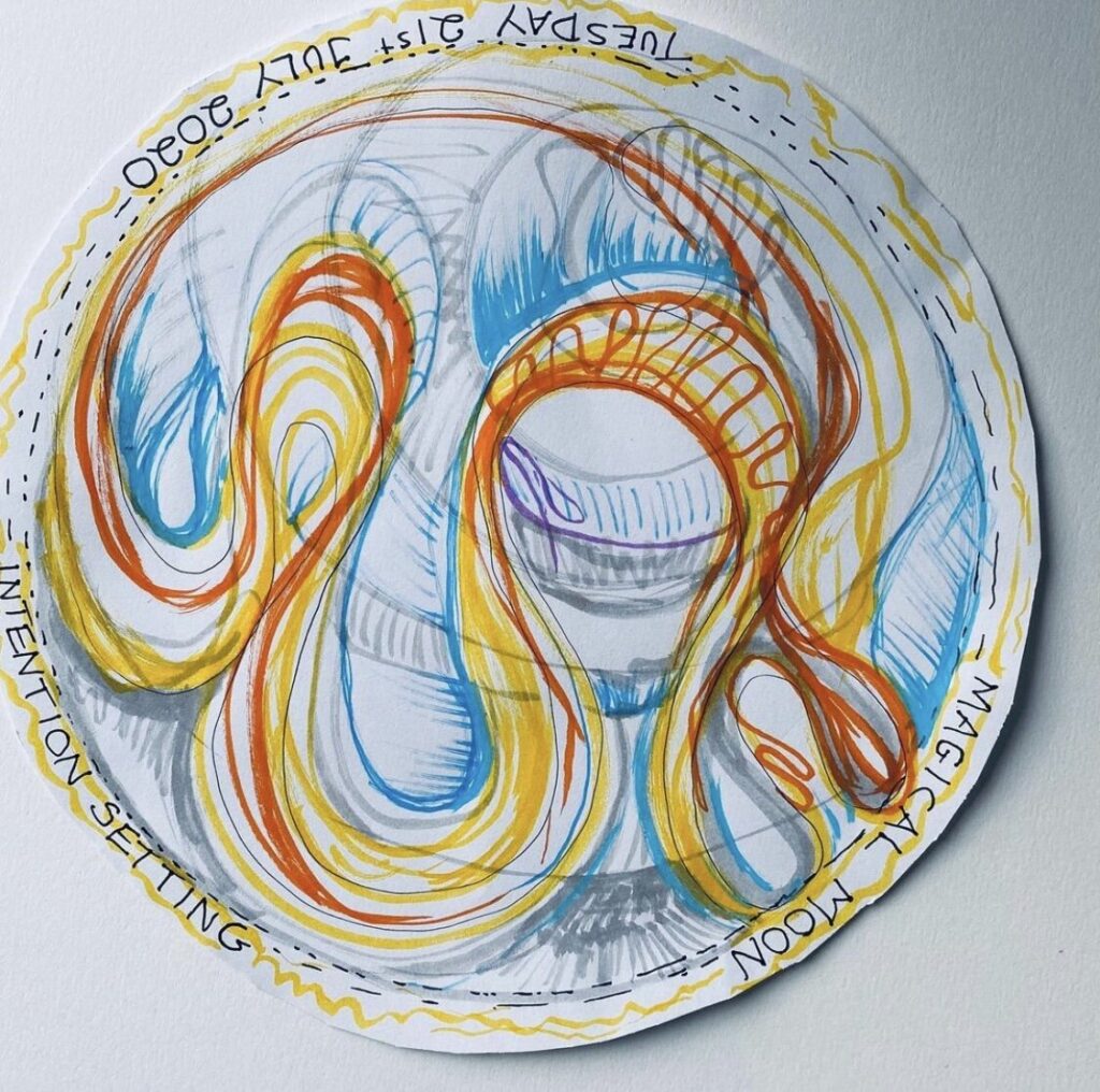 A paper plate with a drawing on it.