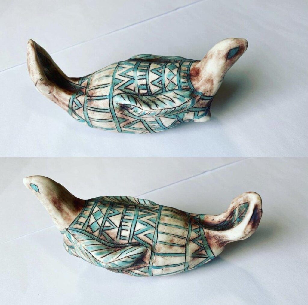 Two pictures of a ceramic bird sitting on a table.