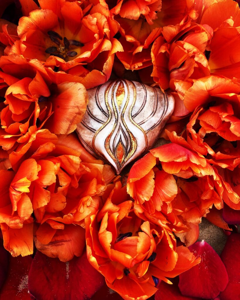 A ring surrounded by orange tulips.